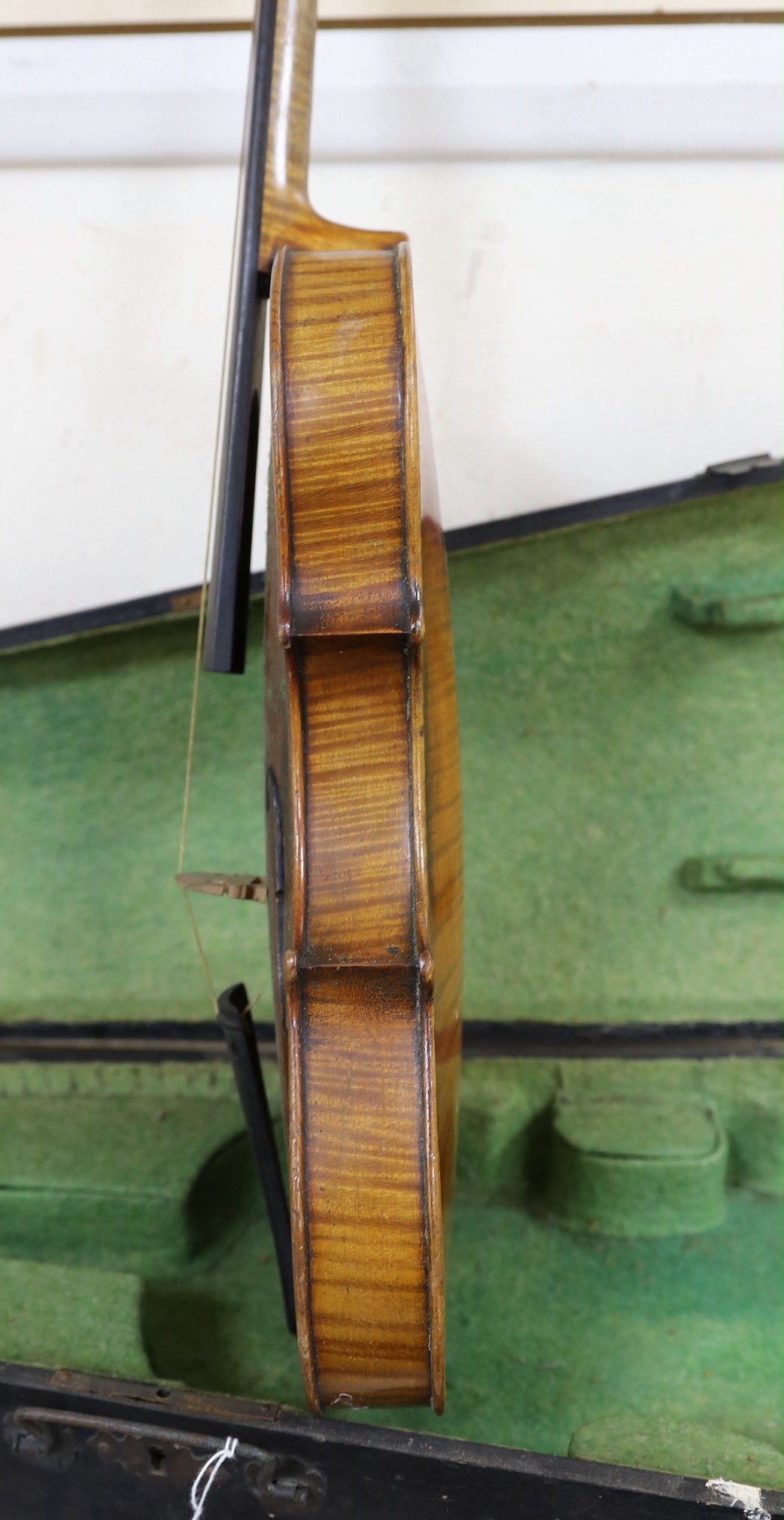 A cased German violin, 60cms long